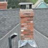 Chimney rebuilt with waterstruck brick to keep the historic look.
